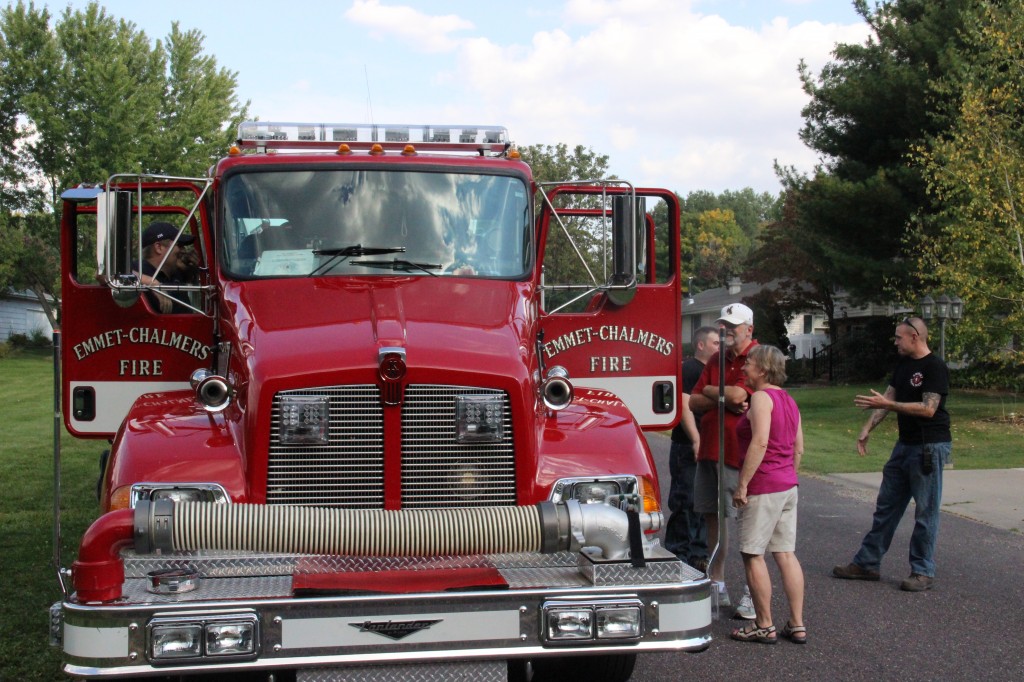 Firefighters showing equipment